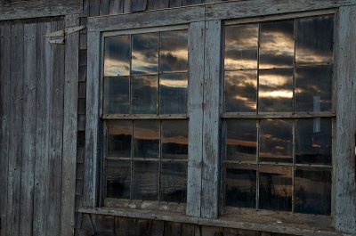 Sunset in old window