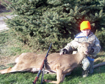 Cole Dishroon was 9yrs old when he shot this 110lb deer in Markleville, IN. with his new Youth 50 cal New England Sidekick