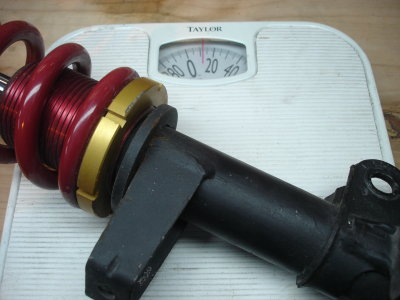 Weighing front strut
