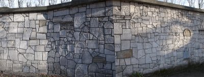 wall with old thombstones at Remuh cemetery