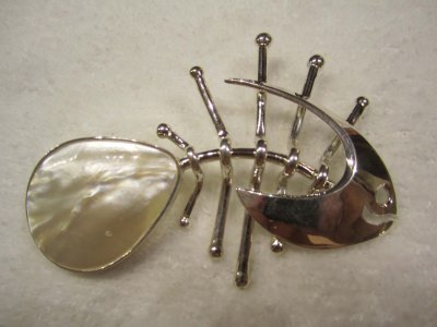 sterling silver fischeele with ma-of-pearl tail