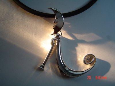 hand carved design in sterling silver