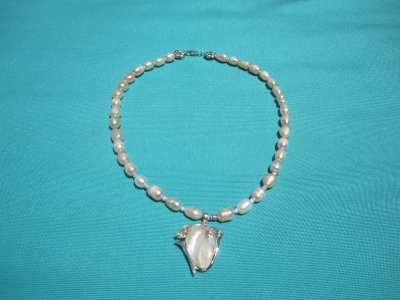 pearls w/ma-of-pearl wrapped in SS