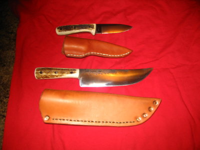 Emily in Daddys hat Jims Knives 001.jpg