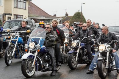 Spams wife Jenny rode to the church and crematorium on the back of his bike