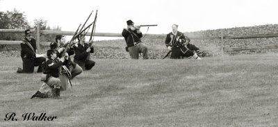 Union Solders Firing On The Confederates And Advancing The Line