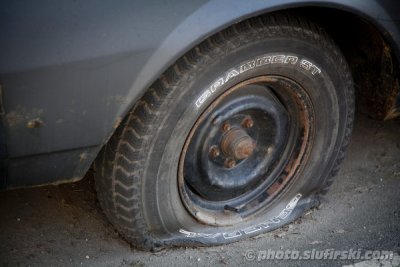 Old Chevrolet - flat tyre...