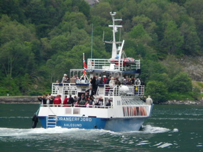 Geirangerfiord - Ferry going out to POLARYS of Hutrigruten