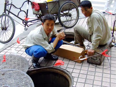 Shanghai-sewerage workers