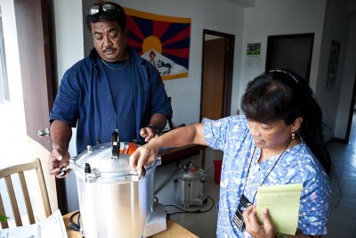 Pelihna Moses RN and Andy Wilson using the autoclave. IMG_7063.jpg