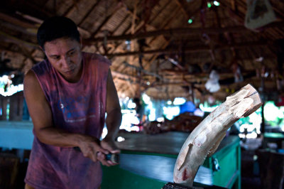 Cutting a shark carving in half to hollow it out. L1017063.jpg