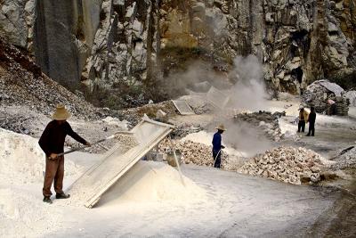 Sifting lime.