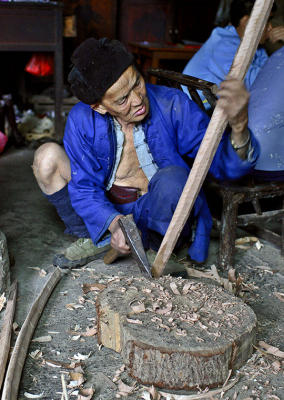 An elder grandfather working wood. #1