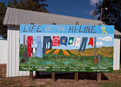 This Hinsdale Community sign sits on US Route 2 which is known as the Hi-Line across the US.