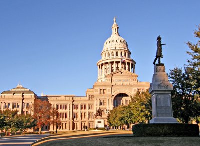 The Texas State Capitol with Firefighters and Terry's Rangers statues.
