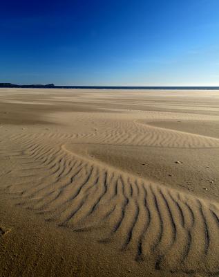 Wind blown sand at Rhosilli Bay