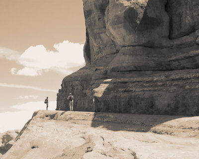on edge, trail to Delicate Arch