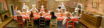 doll at table with food.jpg