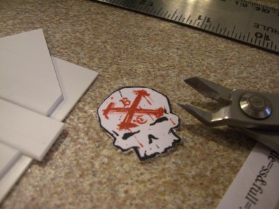 Logo cut out of plasticard