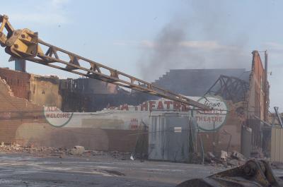 Oxygen Getting in more freely to the smouldering roofing so starting to flame up