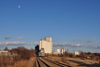 Flagler, CO grain elevators with almost a full moon.