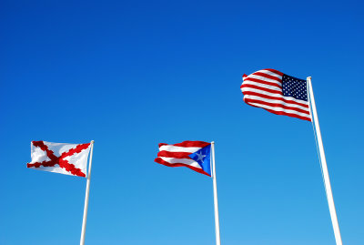 Three flags over El Morro, OSJ