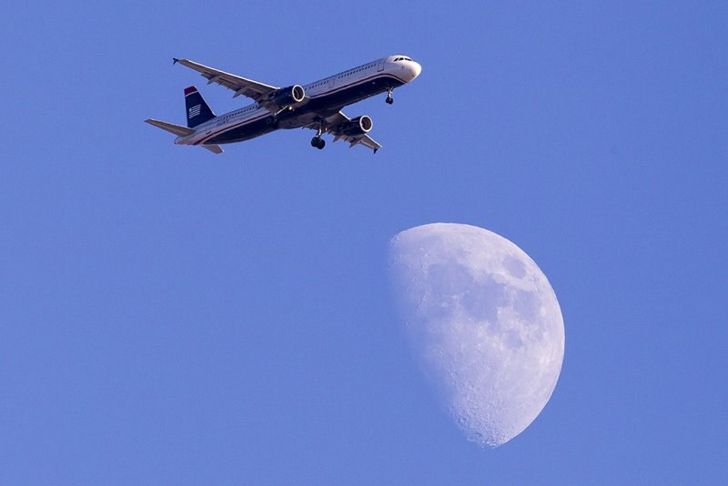 8/25/2012  US Airways Airbus A321-211 N182UW flying by the moon