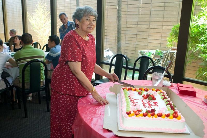Barbara cutting the cake