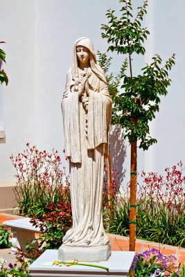 statue of Blessed Virgin Mary outside of Our Lady of the Most Holy Trinity Chapel at Thomas Aquinas College _MG_9668.jpg