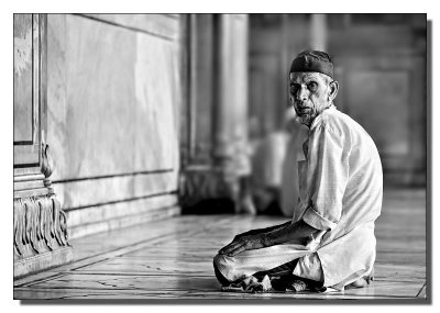 Man between prayers