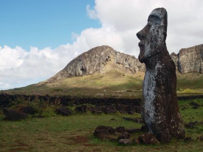 Solitary moai, quarry site in the background