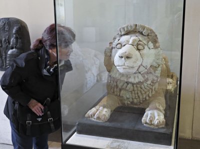 Carolyn and Ancient Lion sculpture.jpg