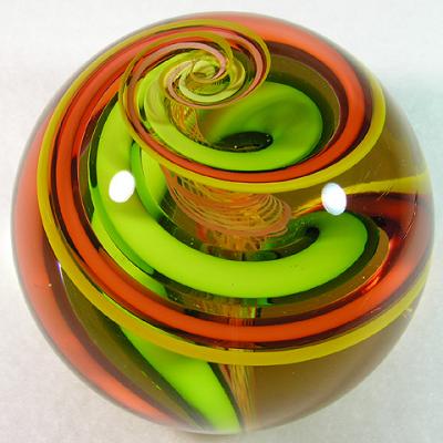 Glass is clear, but camera picks up yellow from the transparent green and red bands