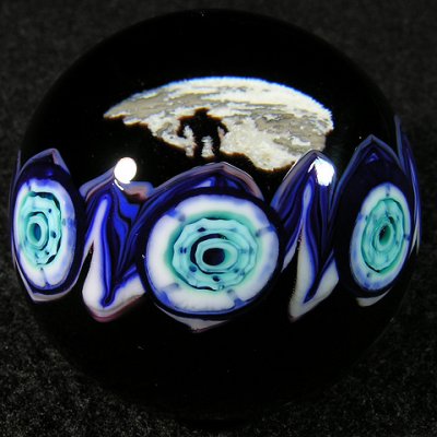 One of my absoute favorite marbles, with the perfect juxtaposition on the two sides.