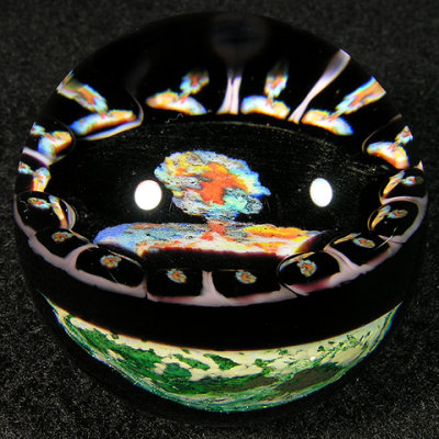 1.60  This marble developed a crack in the mushroom cloud on the backside, but the murrine is intact on the front.