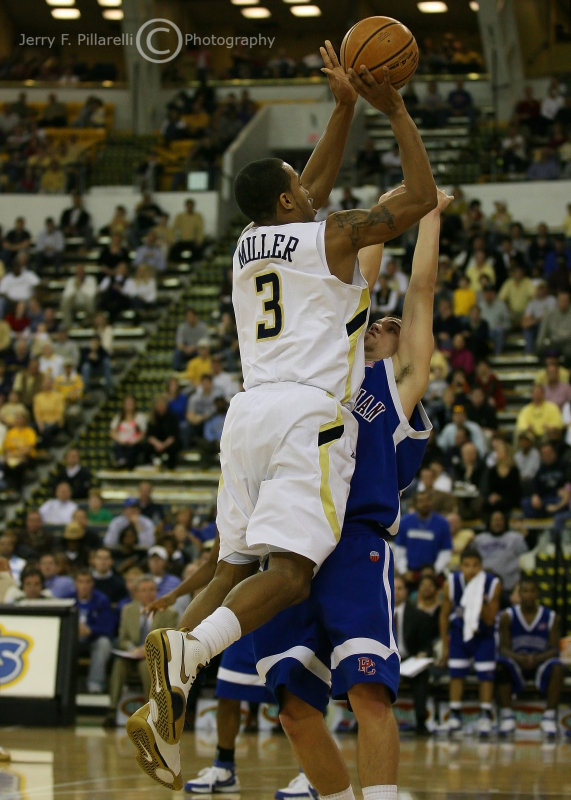 GT G Miller shoots a jumper under pressure