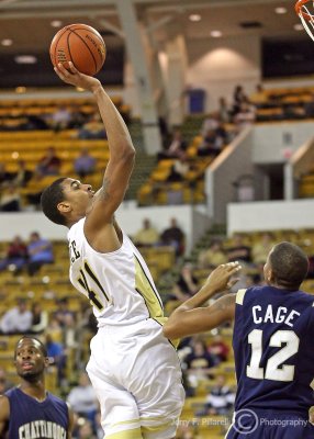 Georgia Tech G Glen Rice Jr. puts up a one handed jumper over Chattanooga G Troy Cage