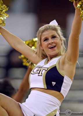 Yellow Jackets Cheerleader during a break in the action