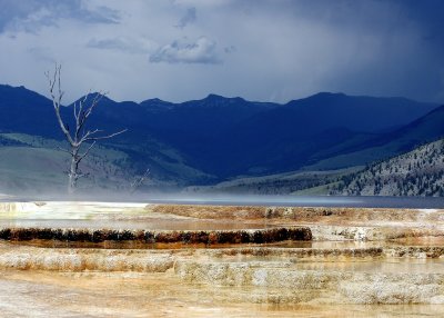 A rainstorm approaches the Main Terrace at Mammoth Hot Springs