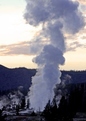 Distant view of a Grand Geyser eruption in the Yellowstone National Park