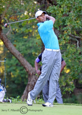 Tiger Woods tees off at the 93rd PGA Championship