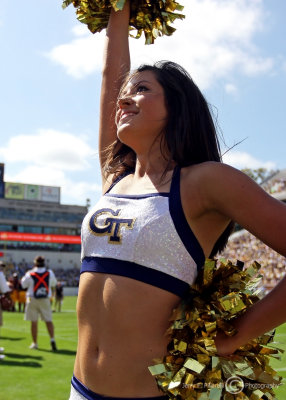 Jackets cheerleader lights up the sidelines