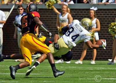 Georgia Tech WR Tyler Melton dives for extra yardage as he’s tackled