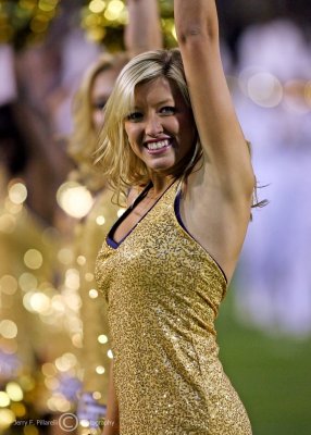 Jackets cheerleader lights up the sidelines