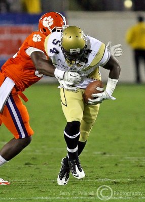 Jackets LB Nealy advances a fumble…later ruled an incomplete pass
