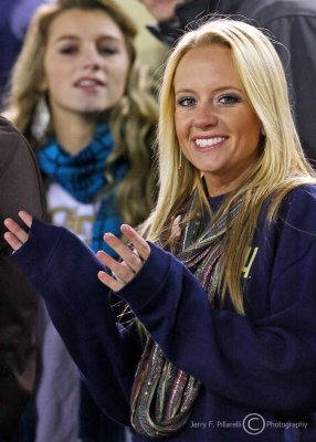 Jackets fan cheers the team on from the front row