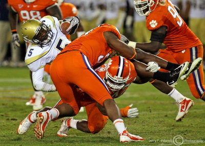 Georgia Tech WR Hill is upended in the Clemson secondary