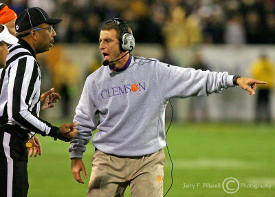 Clemson Tigers Head Coach Dabo Swinney engages in conversation with one of the referees