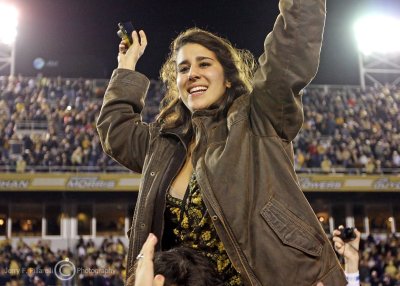 Yellow Jackets fan celebrates on the field