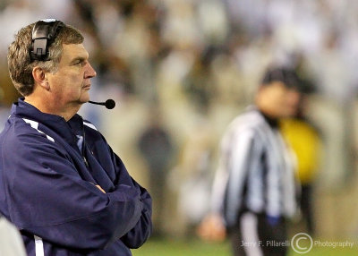 Georgia Tech Head Coach Paul Johnson watches his team from the sidelines